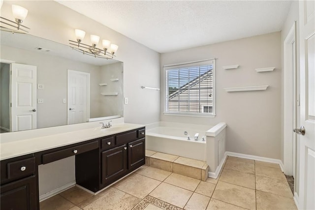 605 Alstonefield Dr, Alpharetta, GA 30004 - bathroom featuring vanity, a garden tub, a textured ceiling, and tile patterned floors