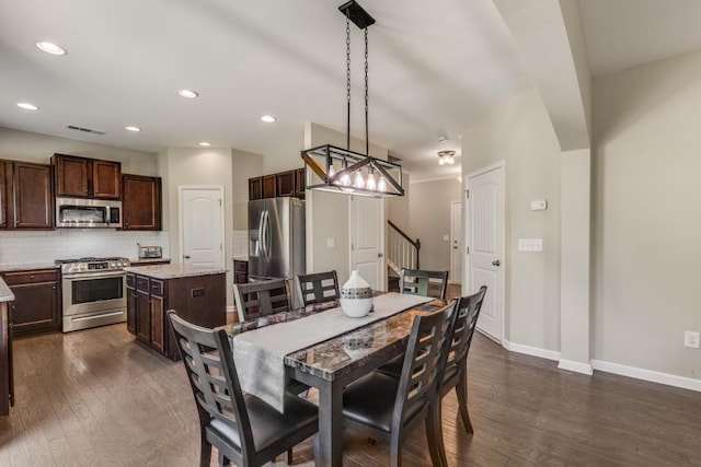 dining room featuring dark hardwood / wood-style floors