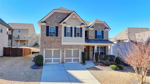 view of front of property with a garage