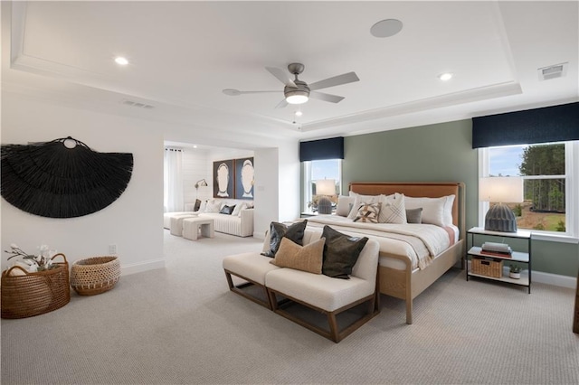 352 Foxglove Way, Mcdonough, GA 30253 - carpeted bedroom with a raised ceiling, multiple windows, recessed lighting, baseboards, and a ceiling fan