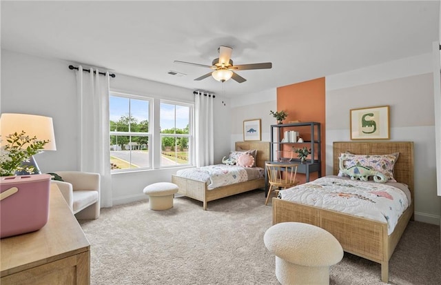 352 Foxglove Way, Mcdonough, GA 30253 - bedroom featuring light colored carpet, baseboards, and ceiling fan