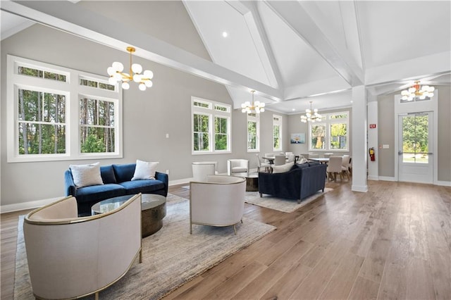 352 Foxglove Way, Mcdonough, GA 30253 - living area featuring a chandelier, baseboards, wood finished floors, beamed ceiling, and recessed lighting
