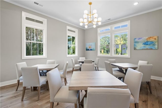 352 Foxglove Way, Mcdonough, GA 30253 - dining room with baseboards, a chandelier, ornamental molding, light wood finished floors, and recessed lighting