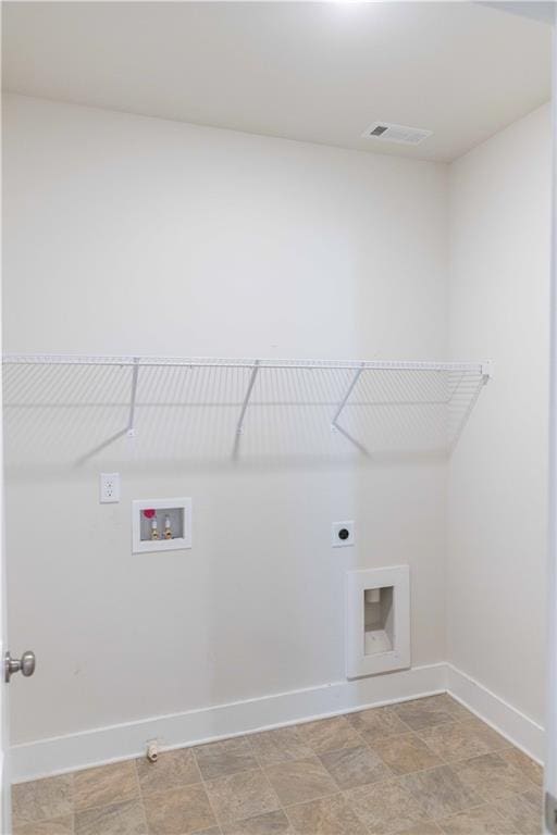 clothes washing area with hookup for a gas dryer, hookup for an electric dryer, and hookup for a washing machine