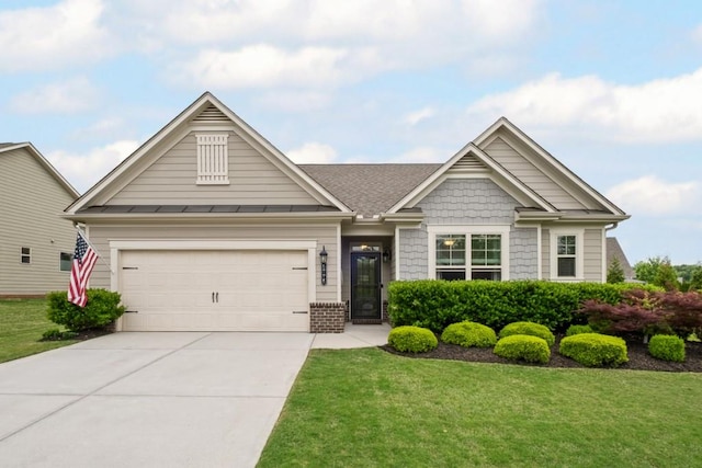 craftsman-style home featuring a garage, a front lawn, driveway, and a standing seam roof