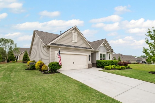 view of front facade with concrete driveway, a front yard, roof with shingles, a standing seam roof, and metal roof