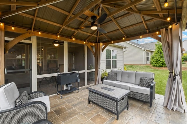 view of patio / terrace featuring an outdoor hangout area, a gazebo, and ceiling fan