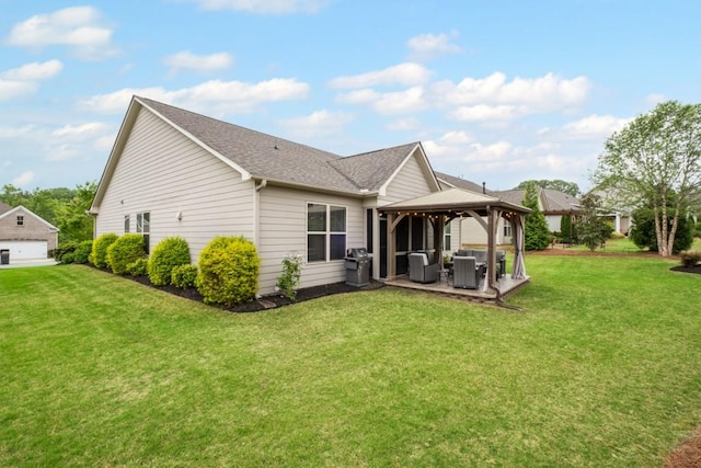back of house featuring a gazebo, an outdoor living space, a lawn, and a shingled roof