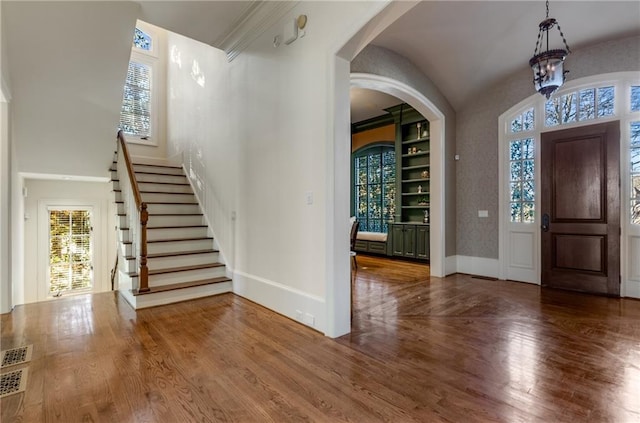 foyer entrance featuring hardwood / wood-style floors