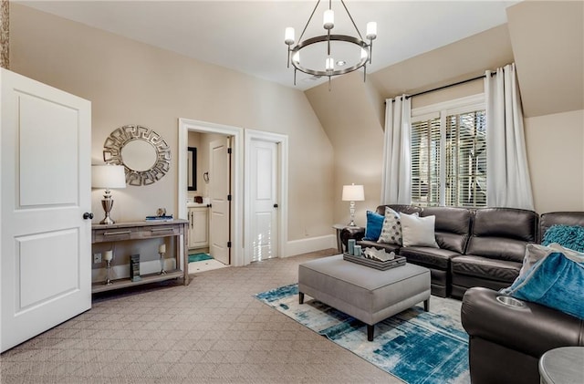 carpeted living room featuring a notable chandelier and lofted ceiling