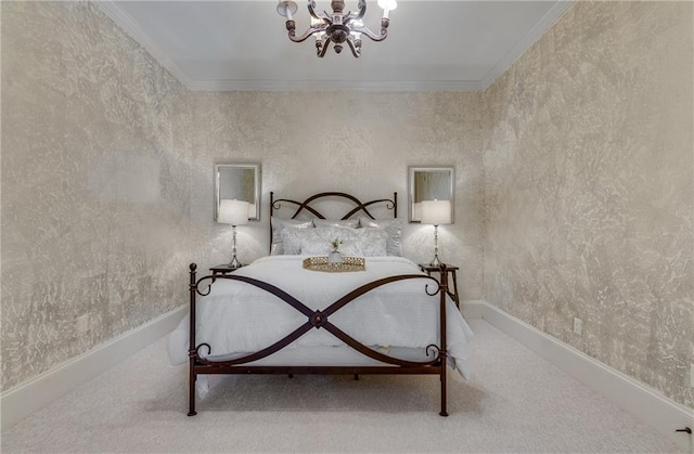 carpeted bedroom with ornamental molding and a chandelier