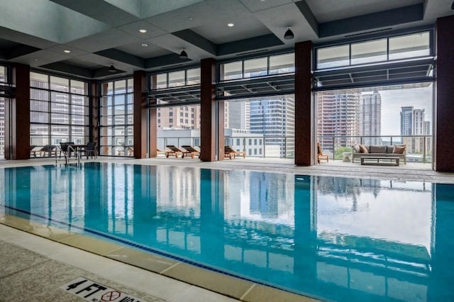 view of swimming pool featuring a view of city