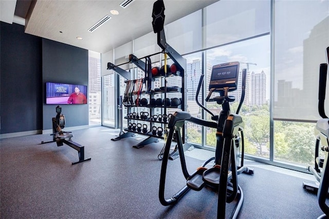 workout area featuring visible vents and baseboards