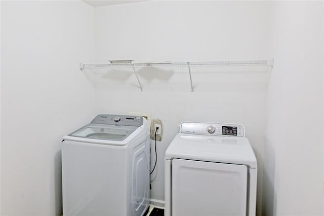 laundry area with washer and clothes dryer