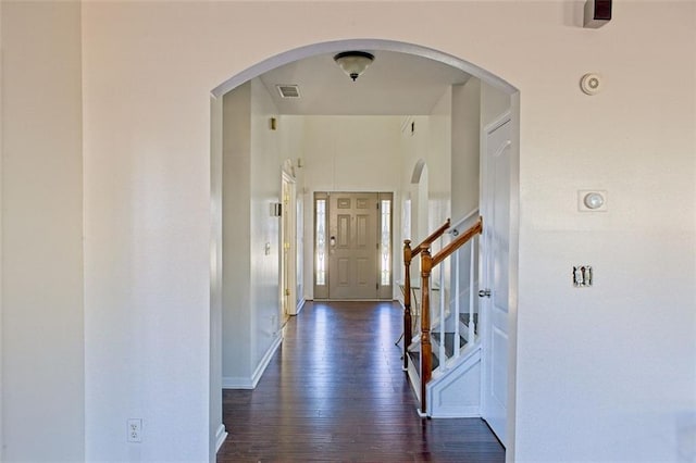 hall featuring dark wood-type flooring