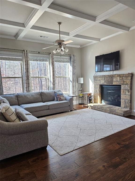 living room featuring coffered ceiling, visible vents, a fireplace, and dark wood-type flooring