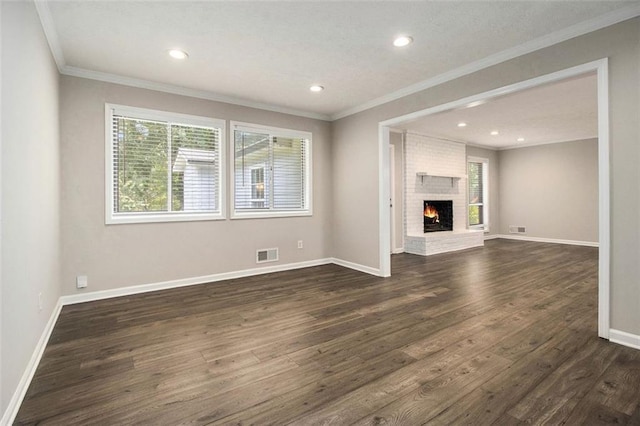 3321 Georgian Woods Cir, Decatur, GA 30034 - unfurnished living room with plenty of natural light, dark wood-style flooring, crown molding, recessed lighting, and a fireplace