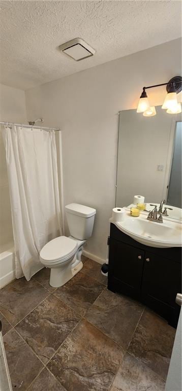 full bathroom with shower / tub combo, vanity, a textured ceiling, and toilet