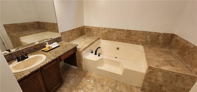 bathroom with vanity and a bathing tub