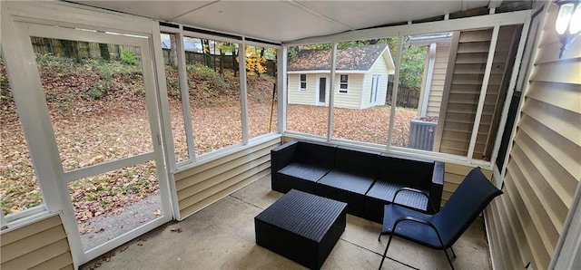 sunroom / solarium featuring a healthy amount of sunlight