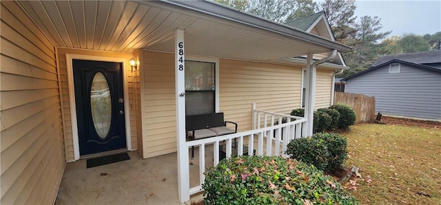 doorway to property with a porch