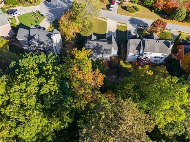 birds eye view of property with a residential view