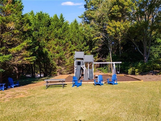 communal playground featuring a yard