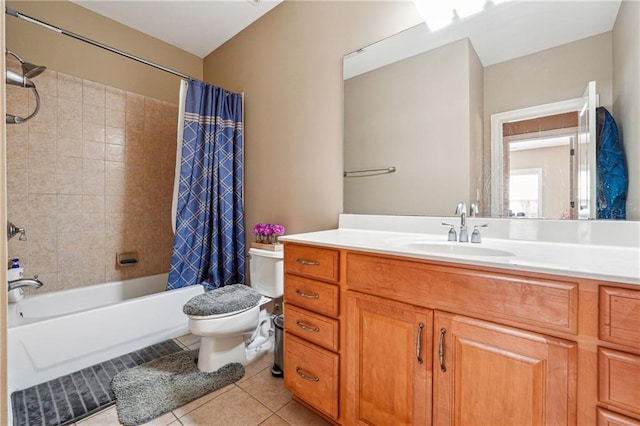 bathroom featuring vanity, toilet, shower / tub combo, and tile patterned flooring
