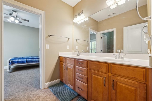 full bathroom with a ceiling fan, a sink, connected bathroom, double vanity, and visible vents