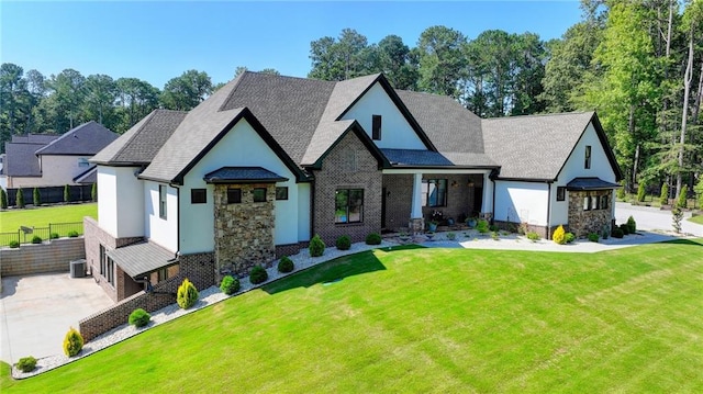 view of front of property with a front lawn and a gazebo