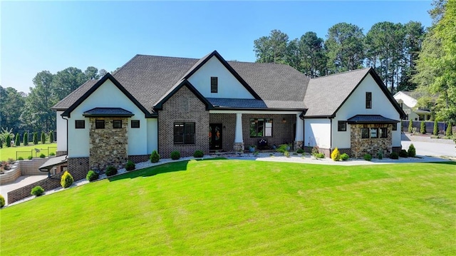 view of front of property featuring a front lawn and a gazebo