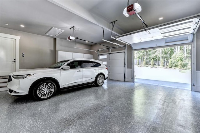 garage featuring a garage door opener