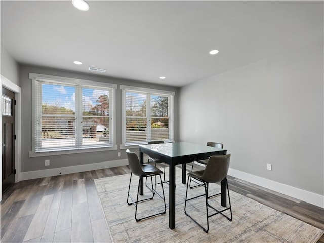 dining room featuring hardwood / wood-style flooring