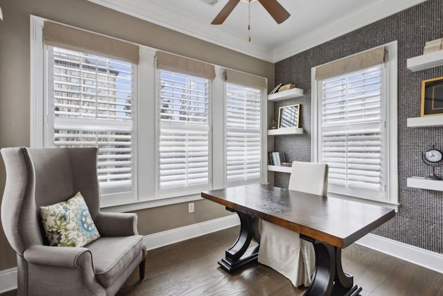 office space with dark wood-type flooring, ceiling fan, and ornamental molding