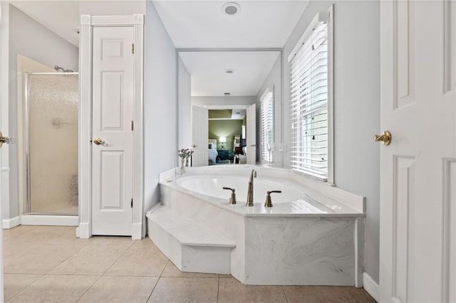 bathroom featuring tile patterned floors and plus walk in shower