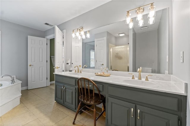 bathroom with tile patterned flooring, plus walk in shower, and vanity