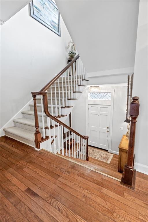 entryway with hardwood / wood-style flooring