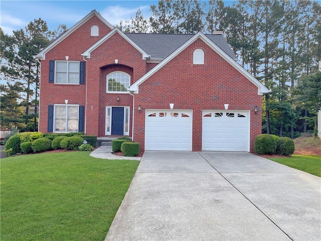 3515 Mcclure Woods Dr, Duluth, GA 30096 - view of front of home with driveway, a front yard, brick siding, and a garage