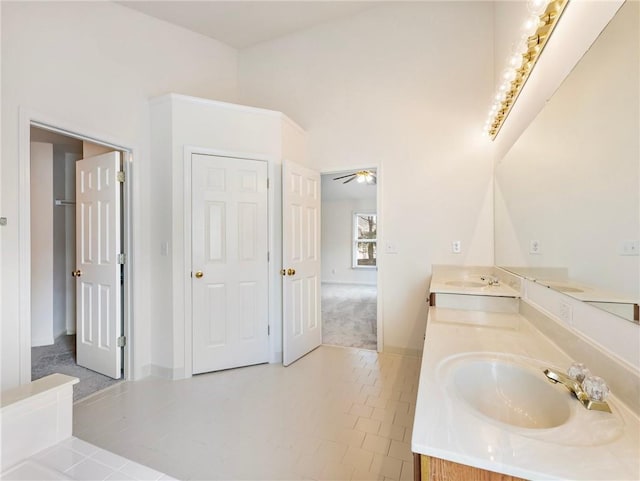 3515 Mcclure Woods Dr, Duluth, GA 30096 - full bathroom featuring double vanity and baseboards