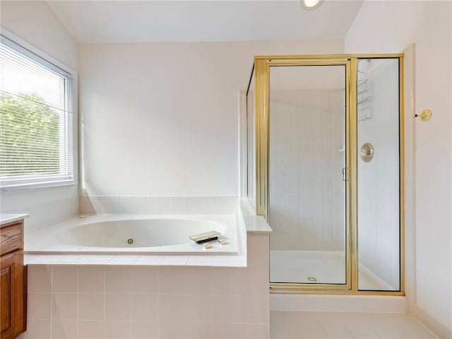 3515 Mcclure Woods Dr, Duluth, GA 30096 - bathroom featuring a shower stall, a whirlpool tub, vanity, and tile patterned flooring