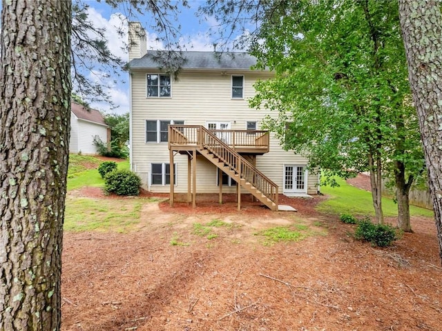 3515 Mcclure Woods Dr, Duluth, GA 30096 - rear view of house featuring french doors, a wooden deck, a chimney, and stairway