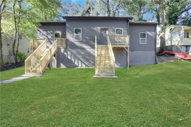 1226 Byewood Ln SW, Atlanta, GA 30310 - back of house with stairway, a yard, and a deck