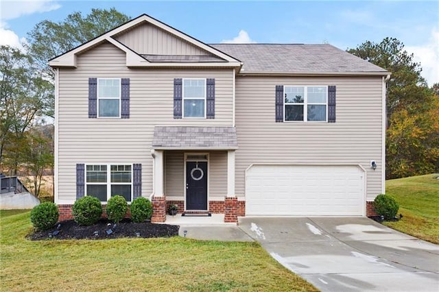 view of front of house with an attached garage, brick siding, a shingled roof, concrete driveway, and a front yard