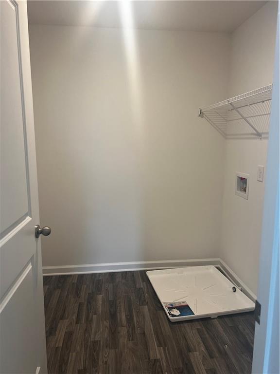 280 River Run Dr, Dallas, GA 30132 - laundry room with dark wood-style flooring, hookup for a washing machine, and baseboards