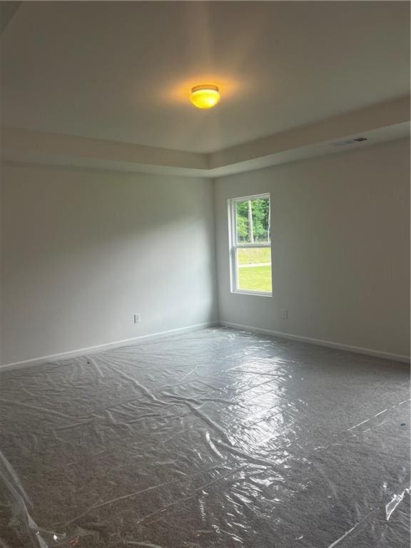 280 River Run Dr, Dallas, GA 30132 - empty room featuring baseboards and a raised ceiling