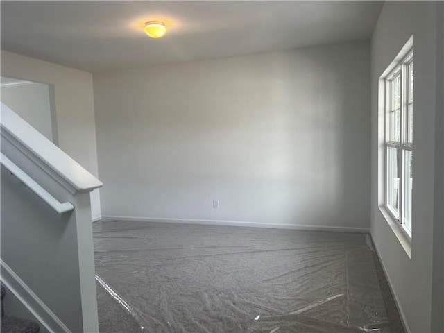 280 River Run Dr, Dallas, GA 30132 - empty room featuring carpet flooring, baseboards, and stairway