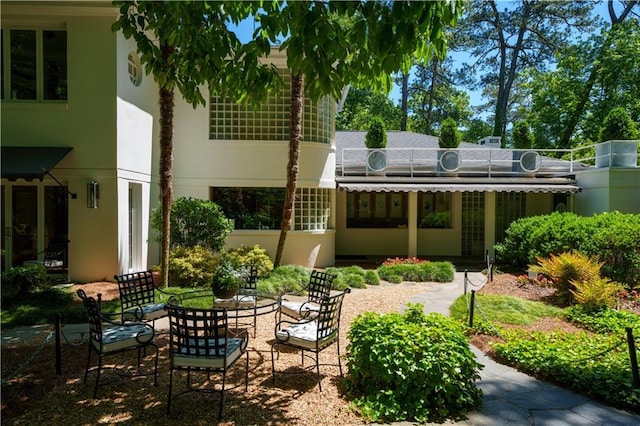 rear view of property with a patio area