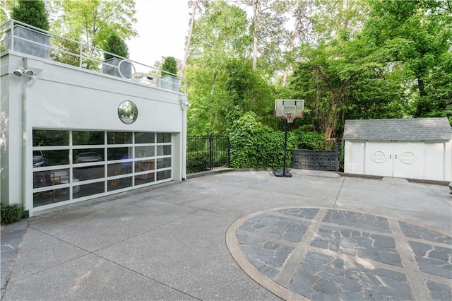 view of patio / terrace with a storage unit