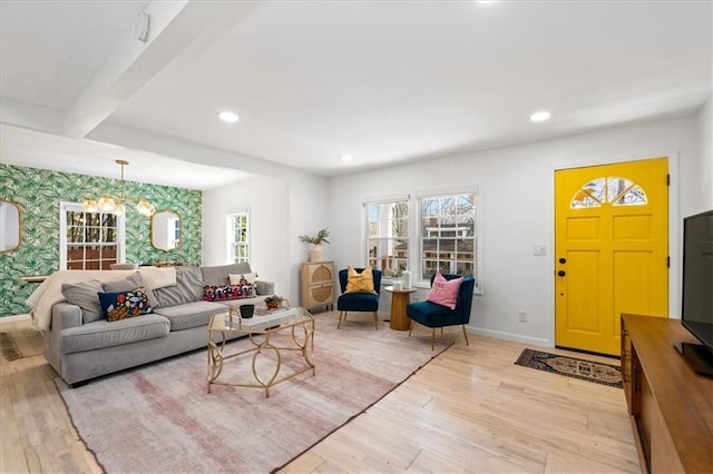 living room with wallpapered walls, light wood-style flooring, recessed lighting, and baseboards