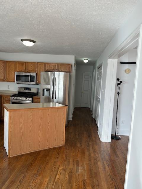 empty room with carpet flooring and electric panel